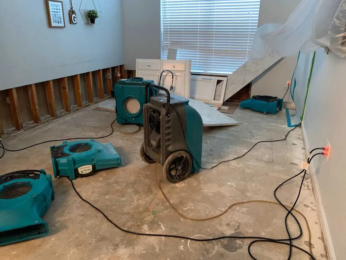 Dehumidifier in flood-cut room for Water Damage Restoration in Concord